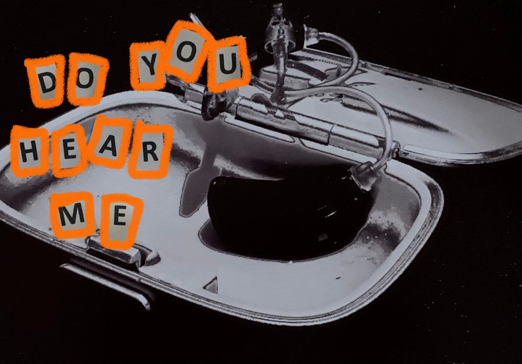 Image of a case open, what looks like some medical equipment or an aid. The words, in tiles, surrounded in orange read 'do you hear me?' and are printed on the left side.